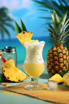 a pineapple drink is garnished with ice