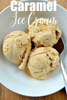 three scoops of caramel ice cream in a white bowl on a wooden table