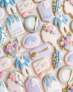 decorated cookies are arranged on a table for a baby's first birthday party or special occasion