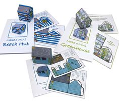 several cards and envelopes with pictures of houses, buildings, and other things on them