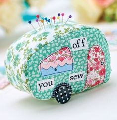 a small sewing case with an image of a camper and the words you sew on it