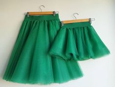 "❤ MADE ESPECIALLY FOR YOU Our kelly green tulle skirts are made to order to your specific measurements. Please check chart size before placing your order or contact me for any detail. ❤ MATCHING SETS The listing is for a matching set with your daughter, so you will receive two tulle skirts. ❤ DETAILS -> fully SEWN tutus, they are NOT tied or knotted -> soft tulle fabric -> lining silk saten -> elastic waistband -> 6 layers of tulle, plus lining -> not see through Manual wash 4 Green Tulle Skirt For Party, Green Summer Party Petticoat, Summer Party Green Petticoat, Fitted Green Tulle Skirt, Green Tulle Skirt, Family Clothes, Green Tutu, Tutu Birthday