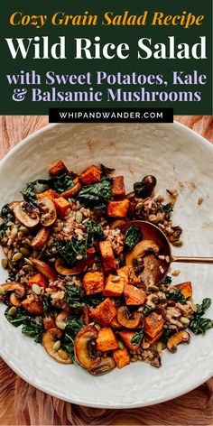 a white plate topped with sweet potatoes, kale and mushrooms