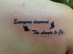 a tattoo saying everyone deserves the chance to fly with two birds on it's back