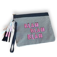 No Boundaries Stylish Striped Wristlet Pouch In A 9"X11" Size. This Zip Pouch Features The Playful Words "Blah, Blah, Blah" Printed Across, Accentuated With A Trendy Tassel For Added Flair. Brand: No Boundaries Size: 9"X11" Condition: Excellent Preowned Color: Black, White Pink Fabric Content: N/A Detailed Measurements For The Item Are Shown In The Pictures. No Boundaries, Striped, Wristlet, Zip Pouch, "Blah, Blah, Blah", Tassel, 9"X11". Be Sure And Explore Our Storefront. Disgruntled Pelican Of Wristlet Pouch, Blah Blah Blah, Black White Pink, No Boundaries, Zip Pouch, Pink Fabric, Boundaries, Cosmetic Bag, Home Goods