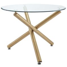 a round glass table with gold legs