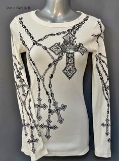 New Womens Vocal Apparel embellished ivory cross rosary ribbed cotton long sleeve tee shirt Size XLarge This incredibly unique and rare Vocal shirt is just stunning. Design on chest is embellished with studs. Ivory tone with black screen print and stones all over. Just GORGEOUS - Juniors Sized. Made in USA by Vocal Apparel This is one of my many HIGHLY sought after old school Vintage Vocal style tops! I have been selling Vocal clothing for over 15 YEARS now and just LOVE this brand! Please see measurements 100% Light Ribbed Cotton - Has Little Stretch Measured without stretching - *XLarge - 16" armpit to armpit unstretched - shoulder to waist 27.5" BE VOCAL - STAND OUT IN A CROWD & PUT A GIRL IN IT before it's gone! XOXO Lisa - Put a Girl In It Cross Wings Tattoo, Tattoo Long Sleeve, Rosary Cross, Cross Rosary, Slim Fit Crop Top, Biker Shirts, Fits Clothes, Wings Tattoo, 2000s Fashion Outfits