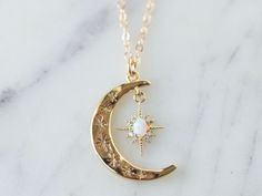 ∙ ∙ C R E S C E N T ∙ M O O N ∙ S T A R ∙ N E C K L A C E ∙ ∙ Made with the following: Gold Plated Crescent Moon Pendant 16mm x 23mm Gold Plated Opal Star Pendant 10mm x 13mm 14K Gold Filled Findings 14K Gold Filled Spring Clasp 14K Gold Filled Chain This listing is for one necklace. The last picture shows the necklace paired with The Paperclip Necklace https://www.etsy.com/listing/1026545416/ (sold separately). ∙ ∙ H O W ∙ T O ∙ O R D E R ∙ ∙ Please select the chain and length from the drop-dow Opal Moon Necklace, Moon And Star Necklace, Paperclip Necklace, Necklace Opal, Fairy Jewelry, Gold Vermeil Jewelry, Crescent Moon Pendant, Moon And Star, Vermeil Jewelry