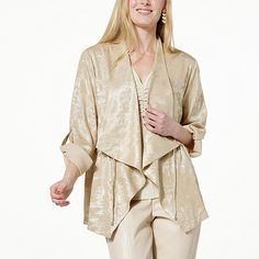 Colleen Lopez Woven Cascade Front Jacket   It's time to shine. This metallic-finish jacket strikes a perfect balance of cozy-chic elegance. The open cascading front design makes this garment an essential layering piece for any wardrobe. Elegant Gold Winter Outerwear, Chic Gold Long Sleeve Outerwear, Elegant Cream Outerwear For Layering, Gold Evening Outerwear For Spring, Cream Evening Blazer For Fall, Chic Gold Cardigan For Fall, Cream Long Sleeve Outerwear For Evening, Chic Gold Outerwear For Spring, Chic Gold Outerwear For Fall