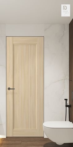 a white bath tub sitting next to a wooden door in a room with marble walls