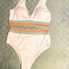 Boutique White With Teal And Coral Bikini Top Has Removable Padding Beachwear Crop Top With Built-in Bra For Beach, Kiini Swimwear Sale Teal, Purple Swimsuit Bikinis, Turquoise V-neck Swimwear For Vacation, Beachy Multicolor V-neck Swimwear, Turquoise Tie-side Bottom Swimwear, Purple Swimsuit, Black Bandeau, Billabong Women