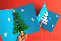 an origami christmas tree made out of paper