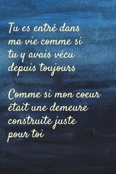 a poem written in french on a blue background with gold lettering and an image of the ocean