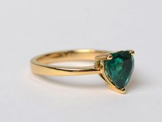 Welcome to my shop, you can find many beautiful gemstone jewelry here, and you also can ask for customized service. Main Stone: 8*8 heart cut lab emerald Accent Stones: noneMetal: 925 sterling silver plated with yellow gold. I also can provide metal options such as 14k solid yellow/white/rose goldSetting: prong setting More rings please go to my shop home: https://www.etsy.com/shop/XCjewelryStudio?ref=hdr_shop_menuIt's a perfect gift for who born in May(birthstone ),it's quite comfortable for we Formal Heart Cut Emerald Ring With Gemstone, Heart Cut Emerald Ring For Wedding, Formal Heart Cut Emerald Ring, Green Emerald Heart Cut Ring With Prong Setting, Emerald Heart Cut Ring With Prong Setting For Wedding, Green Heart Cut Emerald Ring With Prong Setting, Heart Cut Emerald Ring For Anniversary, Heart Cut Emerald Ring For Wedding, May Birthstone, Heart Cut Emerald Ring With Center Stone As Gift