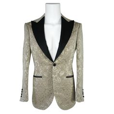 Champagne Oro Designer Fiore Fabric Woven In France Satin Black Signature Peak Lapel Single Button Closure Soft, natural shoulder construction Chest Barchetta Pocket Dual Vents Satin covered buttons in black Handmade in any size! Includes a Sebastian Cruz Couture Pocket Square of your choice! All of our jackets are made with 4" extra of fabric to ensure you don't have to send it back to us if its too small or too big. You can tailor your jacket 2 sizes bigger and/or smaller if needed. We guarant Party Fitted Blazer With Covered Buttons, Luxury Formal Blazer With Covered Buttons, Elegant Party Blazer With Covered Buttons, Luxury Long Sleeve Blazer With Covered Buttons, Semi-formal Blazer With Covered Buttons And Lapel Collar, Designer Blazer With Covered Buttons For Formal Events, Formal Blazer With Covered Buttons And Lapel Collar, Formal Blazer With Lapel Collar And Covered Buttons, Luxury Formal Outerwear With Covered Buttons