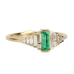 18 Karat Yellow Gold Emerald Ring (0.20 ct) with Graduated Needle Baguette Diamond Sections (0.20 tcw). Ring size 6.5. Gold And Emerald Ring, Gold Ring With Diamond, Gold And Emerald, Fairy Tale Jewelry, Diamond Tops, Emerald Ring Gold, Baguette Diamonds, Ring With Diamond, Baguette Cut Diamond