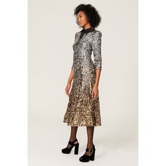 Silver sequins (100% Polyester). Hourglass. Collared neckline. Three-quarter sleeves. Back zipper closure. 50.5" from shoulder to hemline. Imported. Glamorous Fall Formal Sequin Dress, Glamorous Formal Midi Dress With Contrast Sequin, Chic Holiday Midi Dress With Sequins, Chic Sequin Dress For Formal Fall Events, Fall Cocktail Dresses With Contrast Sequin, Formal Sequined Dresses For Fall, Chic Contrast Sequin Dresses For Fall, Formal Fall Dresses With Sequins, Fall Chic Contrast Sequin Dresses