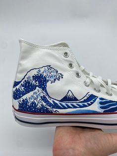 All custom Converse are painted with high quality fabric paint. The paint is also water proof and can be gently cleaned with water and soap. Each shoe may slightly vary in color and design, but is hand painted with lots of care and detail! All custom shoes are fully customizable- I can do other colors and a range of designs from simple to intricate! Just tell me what you want or let me know if you want me to change anything (prices may vary). Please make sure to add your shoe size and size detai Artistic White Canvas Sneakers, Artsy White High-top Sneakers, Hand Painted White Canvas Sneakers, Artistic White High-top Canvas Shoes, Converse Shoes Men, Painted Converse, Galaxy Converse, Painted Shoes Diy, Chuck Taylor Shoes