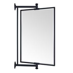 a large mirror hanging from the side of a metal wall mounted shelf with two black brackets