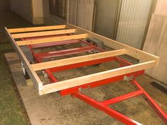 the trailer is being built and ready to be used as a bed frame for an rv