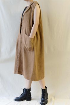 "❤Size: one size Length:103cm(40.6\") Bust:122cm(48\") ❤Material: 100% Linen ❤Color: Brown, Coffee, Dark Gray, Burgundy, Black, Original hemp color. ❤ Season : Spring, Summer, Autumn, Winter. ❤For custom size, i need some measurements as following: Bust? Waist? Hips? Height? Dear Customers Welcome to ohyeahrock,we are a entrepreneurial team for making fashion party garments. Graduated from Shanghai Institute of Design, 100% handmade and we can offer a variety of different styles of fabric for yo Casual Sleeveless Outerwear With Pockets, Brown Relaxed Fit Outerwear For Summer, Casual Oversized Sleeveless Outerwear, Oversized Sleeveless Casual Outerwear, Casual Sleeveless Vest With Side Pockets, Casual Beige Vest With Pockets, Sleeveless Khaki Outerwear For Spring, Khaki Sleeveless Outerwear For Spring, Fall Sleeveless Vest With Side Pockets