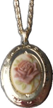 a necklace with an image of a rose on it's front and back sides