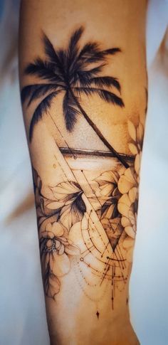 a person with a palm tree tattoo on their arm