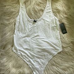 New Never Worn With Tag Sleeveless Bodysuit For Summer Lounging, Sleeveless Summer Bodysuit For Lounging, Stretch Bodysuit For Summer Lounging, Stretch Bodysuit For Lounging In Summer, Spring Sleeveless Bodysuit For Lounging, Yellow Bodysuit, Cutout Style, Strapless Bodysuit, Backless Bodysuit