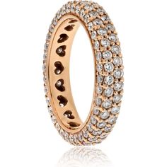 an 18k rose gold ring set with white and brown diamonds, in the shape of hearts