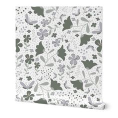 a white and green floral pattern on a canvas wall art print with polka dot dots