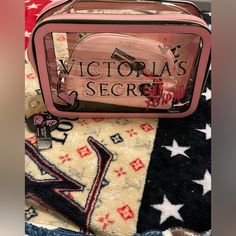 The Victoria's Secret 3pc Makeup Bag Is A Stylish And Practical Set That Includes Three Separate Bags Designed To Keep Your Makeup Organized And Easily Accessible. The First Bag Is A Larger, Rectangular-Shaped Bag That Serves As The Main Compartment. It Features A Durable And Sleek Exterior, Typically Made Of High-Quality Materials Such As Faux Leather Or Nylon. The Bag Is Often Adorned With The Iconic Victoria's Secret Logo Or Other Decorative Elements, Adding A Touch Of Elegance. Inside The Ma Pink Rectangular Victoria's Secret Bag, Victoria's Secret Pink Cosmetic Bag For Everyday Use, Victoria's Secret Pink Cosmetic Bag, Victoria's Secret Travel Cosmetic Bag With Removable Pouch, Victoria's Secret Rectangular Cosmetic Bag For Daily Use, Victoria's Secret Pink Pouch Bag, Lace Makeup, Bombshell Makeup, Victoria's Secret Logo