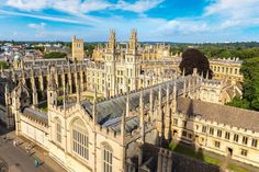 an aerial view of the cathedral and surrounding buildings in oxford, england on a sunny day