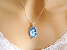 "Real Cameo Necklace, New Mom Gift, Mother and Child Cameo Necklace Sterling Silver Carved Agate, Blue Cameo Necklace, Cameo Jewelry Jewellery I love the sweetness in this beautiful genuine carved agate Victorian Mother/Child cameo necklace. The pendant is a neoclassical woman and child against a blue background. This is the real thing - carved from agate stone, and is framed in sterling silver hanging on a sterling silver chain. Length: your choice - 16 to 30 inches Pendant: 1.38 inches (18 x 1 Blue Cameo Jewelry For Formal Occasions, Formal Blue Cameo Jewelry, Blue Cameo Necklace For Wedding, Blue Cameo Jewelry For Wedding, Blue Cameo Necklace For Formal Occasions, Victorian Mother, Carved Agate, Mother Child, Cameo Jewelry