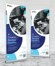 two roll - up banners with the words creative business in blue and white on them