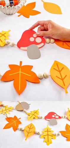 someone is making an autumn leaf garland out of construction paper