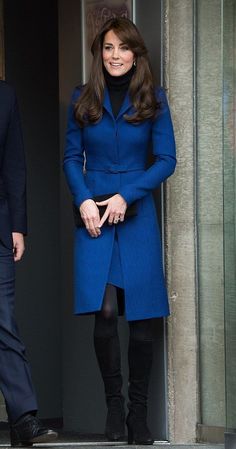 the duke and duchess of cambridge are seen leaving an official building