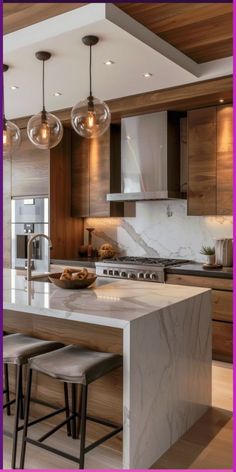 an image of a kitchen setting with marble countertops and pendant lights over the island