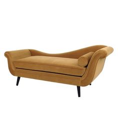 a tan couch with black legs and arms