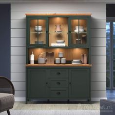 an image of a green china cabinet in the living room