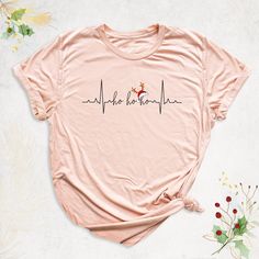 Christmas EKG Nurse Shirt, Heartbeat Christmas Shirt, EKG Line Christmas Shirt, Christmas Party Tee, Medical Christmas Shirt, Xmas Nurse Tee Hello, Thanks for your support. Your gladness comes first and all work is done with LOVE in here. Always keep your support, please:)  Christmas EKG Nurse Shirts are branded Bella+Canvas.   Christmas EKG Nurse Shirt Contents: - Solid colors: %100 Cotton. - Heather colors: %52 Cotton + %48 Polyester* This ultra-soft graphic tee is made from a comfortable cott Medical Christmas Shirts, Ekg Nursing, Medical Christmas, Cricut Nurse, Done With Love, Nurse Shirts, Soft Graphic, Nurse Christmas, Tech Shirt