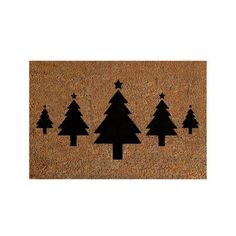 a door mat with black trees on it