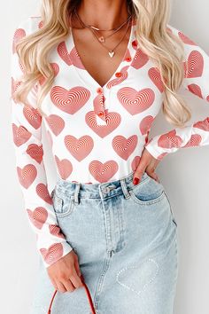 PREORDER Madly In Love Spiral Heart Print Long Sleeve Bodysuit (Red/Wh · NanaMacs Cute Red V-neck Top, Trendy Red Top With Heart Print, White Long Sleeve Tops With Heart Print, Cute V-neck Top With Heart Print, Spring V-neck Top With Heart Graphic, Spring V-neck Tops With Heart Graphic, Spring V-neck Top With Heart Print, Heart Print V-neck Top For Spring, Casual Long Sleeve Sleepwear With Heart Print