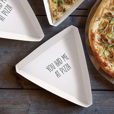 three pizzas on plates with the words you had we at pizza