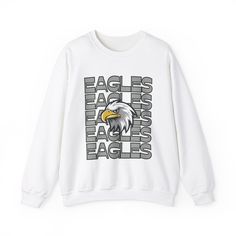 Eagles Mascot Sweatshirt Description: Show your school spirit with the Eagles sweatshirt! Ideal for any situation, this unisex heavy blend crewneck sweatshirt offers pure comfort and style. Made from a perfect blend of 50% cotton and 50% polyester, this sweatshirt ensures your designs look fresh and beautiful. Features: Comfortable Fabric: The medium-heavy fabric blend feels cozy, making it the perfect choice for those colder months. Durable Design: Double-needle stitching at the shoulder, armho Eagles Mascot, Eagles Sweatshirt, The Eagles, School Pride, School Spirit, Cut And Style, Eagles, Crewneck Sweatshirt, Sweat Shirt