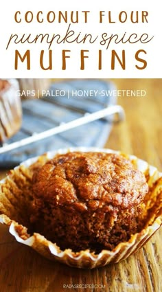 a close up of a muffin in a paper cup on a wooden table with the title coconut flour pumpkin spice muffins