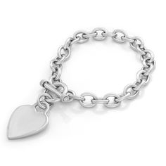 A classic way to show your love. Personalize up to 8 characters for free! Your choice of Sterling Silver or Signature 1.25 micron 24K yellow gold plating Available in your choice of 7 or 8 inches Secure and stylish toggle clasp Approximate gram weight: 7 inch 30.00 gr. and 8 inch 32.00 gr. Email your personalization to: info@robertomartinez.com Style # SB229 or SB229-YG Luxury Classic Hallmarked Sterling Silver Bracelet, Classic Heart Shaped Chain Bracelet As Gift, Classic Heart-shaped Chain Bracelet As Gift, Classic Heart-shaped Chain Bracelet Gift, Classic Heart Charm Bracelet For Valentine's Day, Heart Shaped Bracelet With Toggle Clasp As Gift, Valentine's Day Gift Bracelet With Toggle Clasp, Heart-shaped Charm Bracelet With Toggle Clasp As Gift, Heart Charm Bracelet With Toggle Clasp For Gift