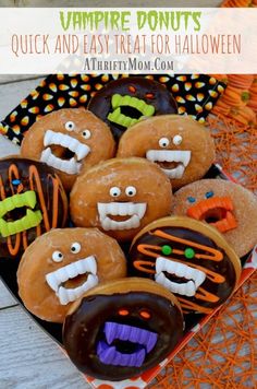 some decorated donuts in the shape of monster faces on a plate with text overlay that says, vampire donuts quick and easy treat for halloween