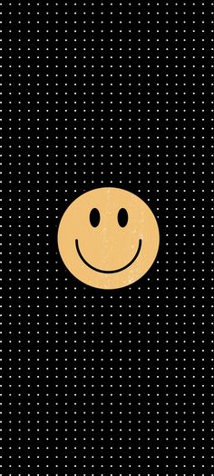 a smiley face on a black background with white polka dotes in the bottom right corner