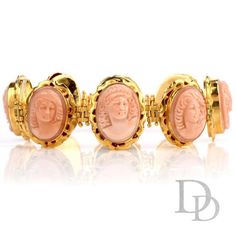 This delicate and intricate vintage coral bracelet was crafted in 18K yellow gold. Featuring 8 carved coral Cameos bezel set, each measuring appx. 14.50mm x 19.50mm.Each cameo face is unique and all are hinged between and set in an intricately carved link.Measuring appx. 24.38mm x 7.25 Inch, this soft pinkish colored coral cameo bracelet will enhance any attire.Stamped with purity mark.Remains in Excellent Condition.Accompanied by a professional appraisal document. Luxury Carved Bracelets For Formal Occasions, Luxury Carved Jewelry For Formal Occasions, Luxury Cameo Jewelry, Yellow Gold Intaglio Bracelet For Formal Occasions, Carved Bangle Jewelry For Formal Occasions, Carved 14k Gold Jewelry For Formal Occasions, Formal Carved 14k Gold Jewelry, Luxury Carved Bracelet Jewelry, Luxury Coral Jewelry For Formal Occasions