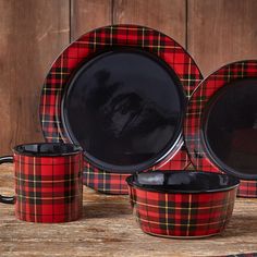 red and black plaid dinnerware set on wooden table